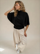 Diffusion by Kate Sweater Margot Pure Wool Cape Sweater in Black