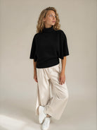 Diffusion by Kate Sweater Margot Pure Wool Cape Sweater in Black